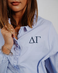 WOMEN'S RUFFLE PLACKET WOVEN BUTTON DOWN SHIRT