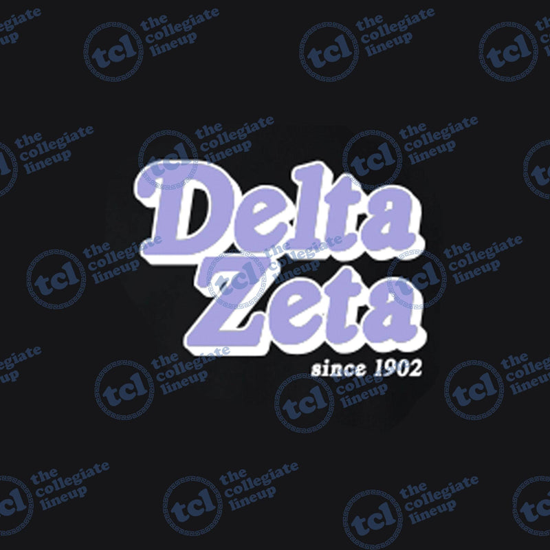 A graphic design for Delta Zeta sorority featuring the name in lavender bubbly letters with a white outline and 'since 1902' written below, all on a black background.