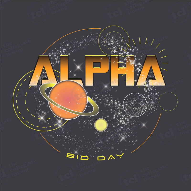 Space-themed graphic design featuring the word 'ALPHA' in metallic gold font above a ringed planet and stars, with 'BID DAY' text at the bottom, all set against a dark grey background.