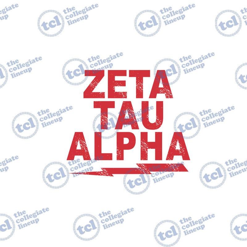 Distressed red Zeta Tau Alpha text in a rock-inspired font with a red lightning bolt graphic.